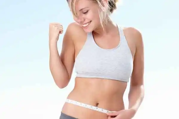 woman happy after fat reduction treatment Cannock