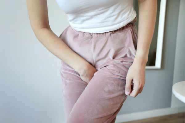 older woman running to the toilet because of urinary incontinence Cannock